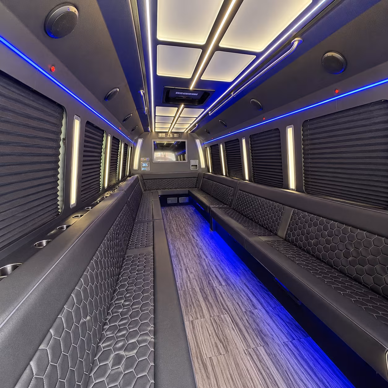 Wedding guests seated inside a party bus serving Fort Worth