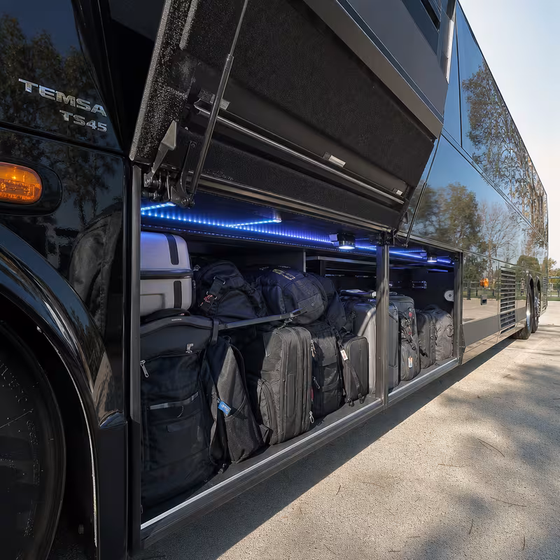 Party bus interior with wraparound leather seating and LED lighting in Fort Worth